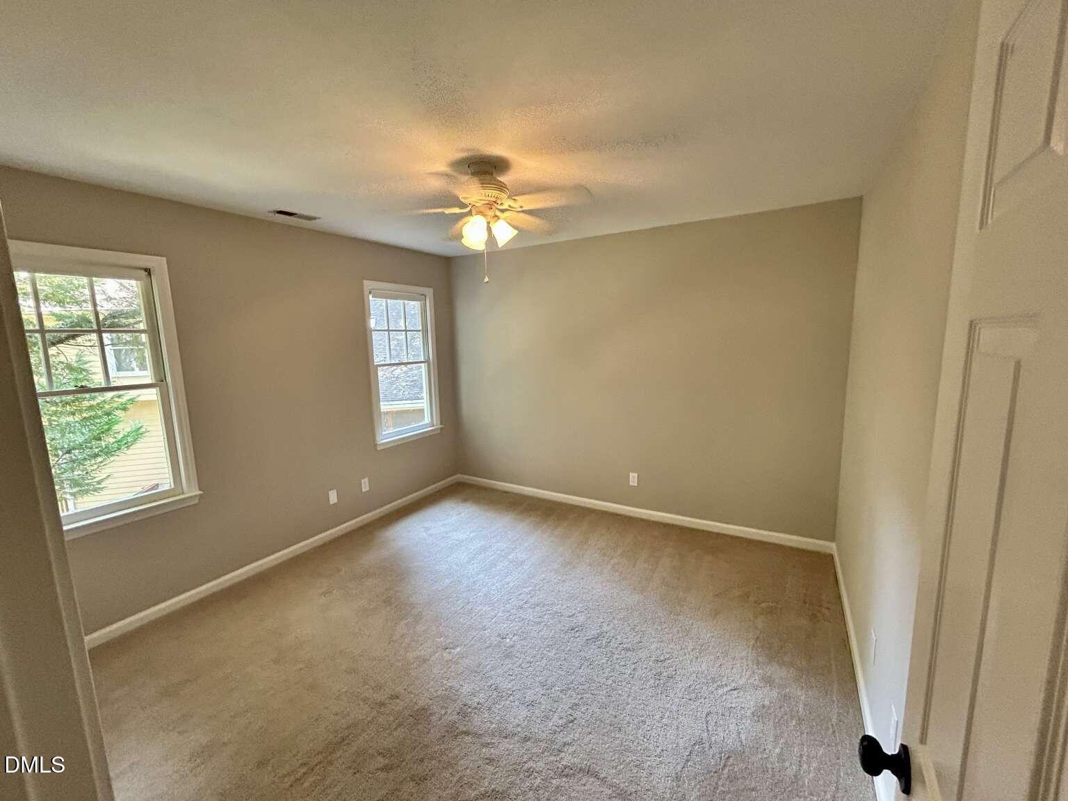 113 Ravenna Way Cary, NC 27513 - Photo 25 of 39 a view of an empty room with a window