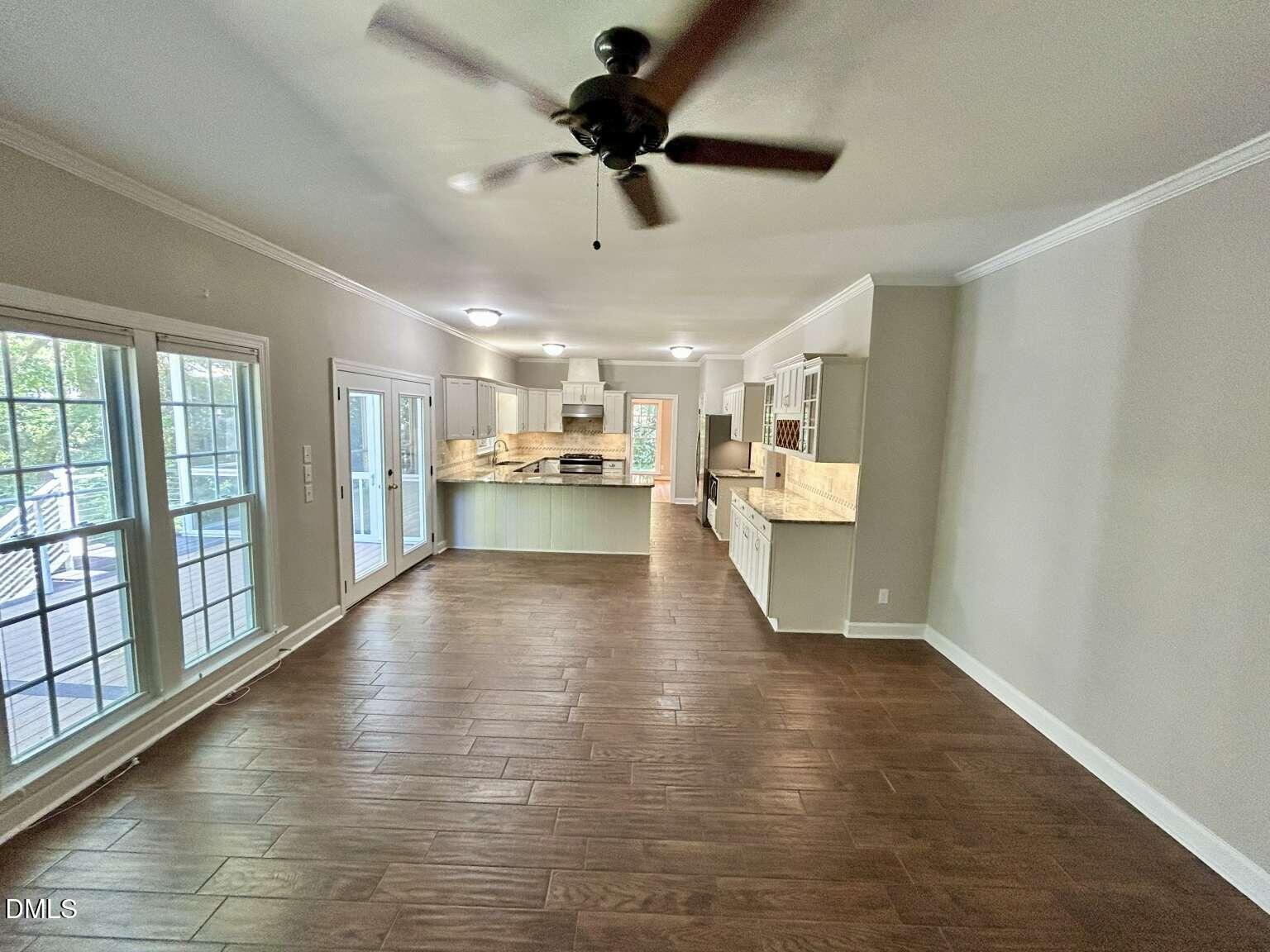 113 Ravenna Way Cary, NC 27513 - Photo 9 of 39 a view of a kitchen with a sink and a window