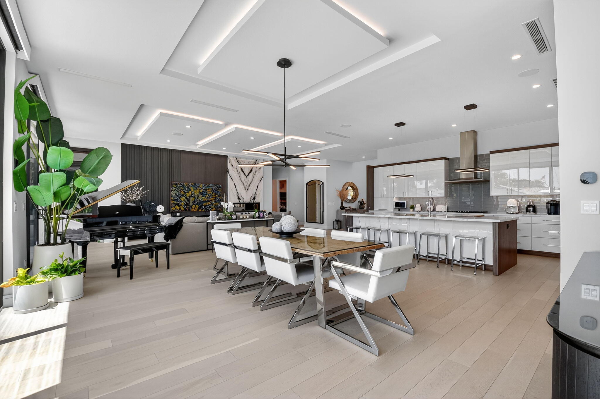 770 Enfield Street Boca Raton, FL 33487 - Photo 18 of 90 a living room with lots of furniture and a dining table