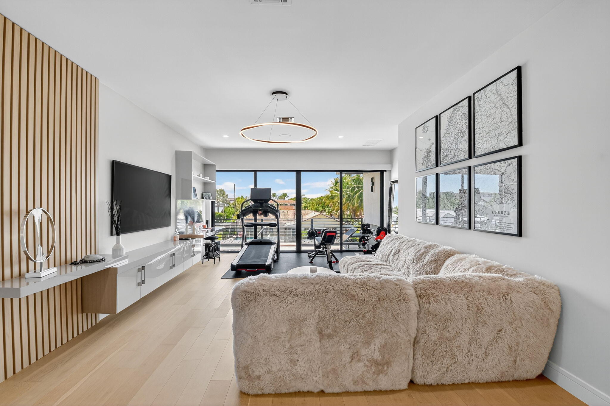 770 Enfield Street Boca Raton, FL 33487 - Photo 41 of 90 a living room with furniture and a flat screen tv