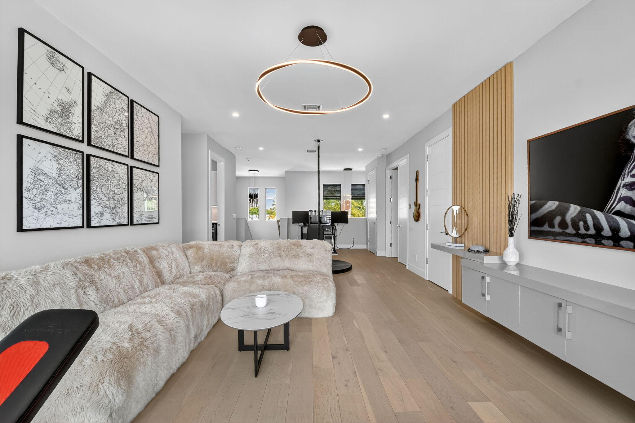 770 Enfield Street Boca Raton, FL 33487 - Photo 43 of 90 a living room with furniture and a chandelier