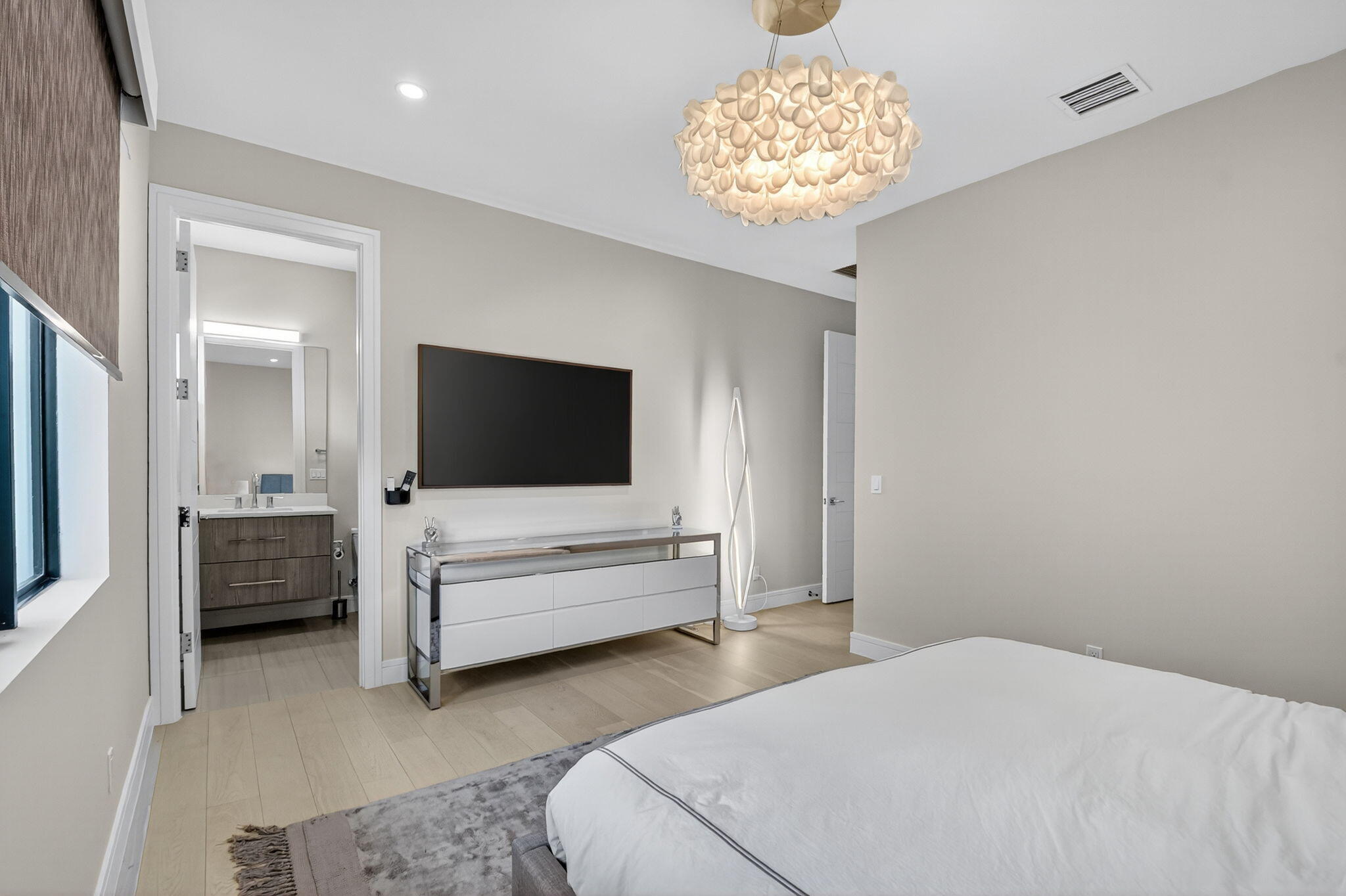 770 Enfield Street Boca Raton, FL 33487 - Photo 49 of 90 a bedroom with a bed and a flat screen tv