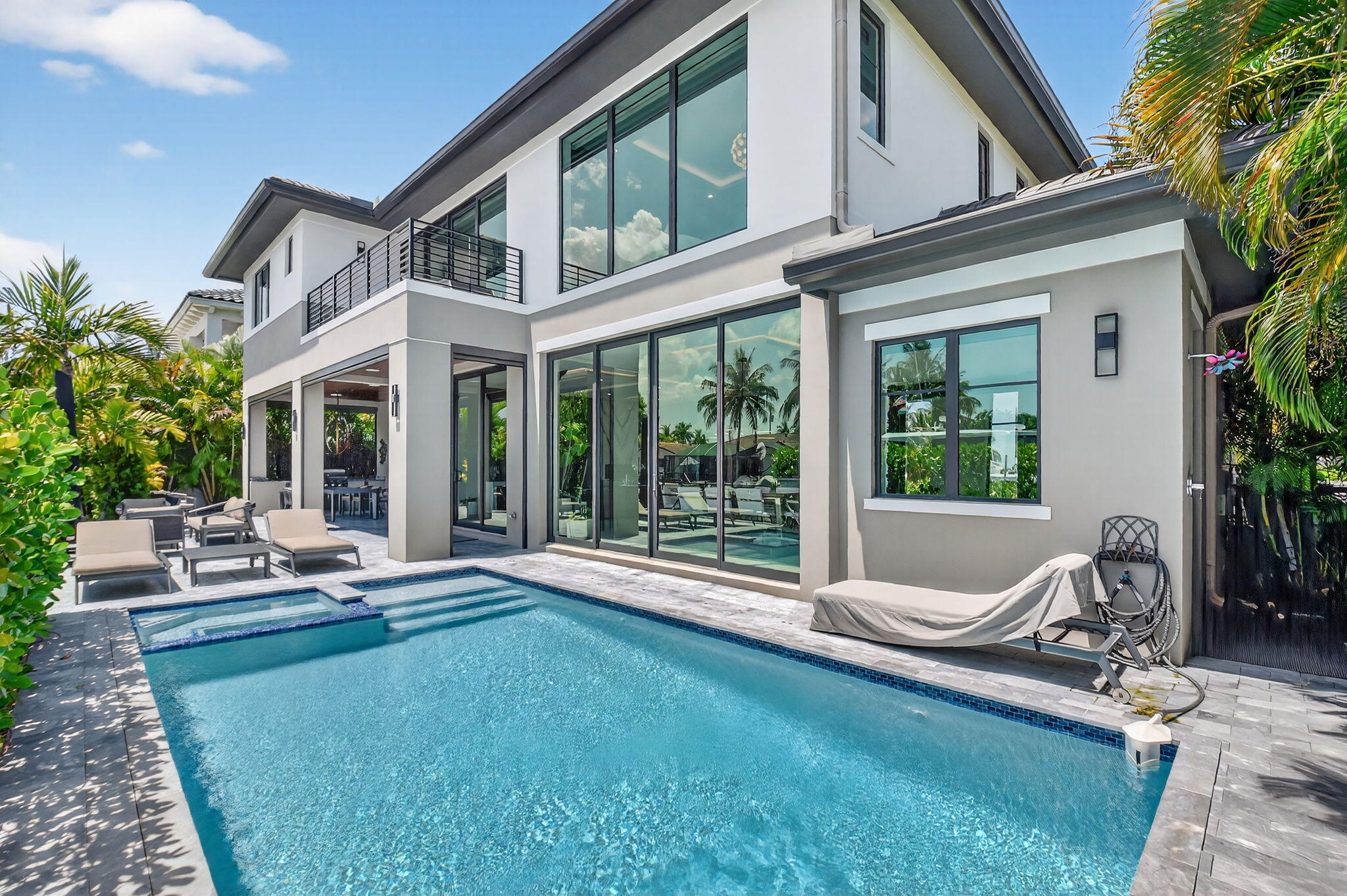 770 Enfield Street Boca Raton, FL 33487 - Photo 79 of 90 a view of a house with backyard porch and sitting area