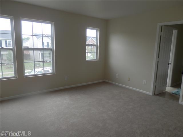 772 Runningbrook Lane Rural Hall, NC 27045 - Photo 5 of 9 Master Bedroom. Master suite with walk in closet, private bath.