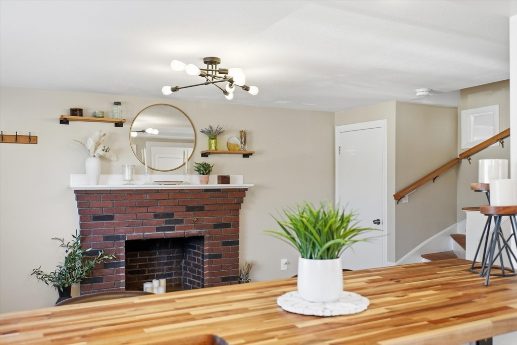 27 Garfield Avenue Saugus, MA 01906 - Photo 12 of 41 a view of living room with furniture and potted plant