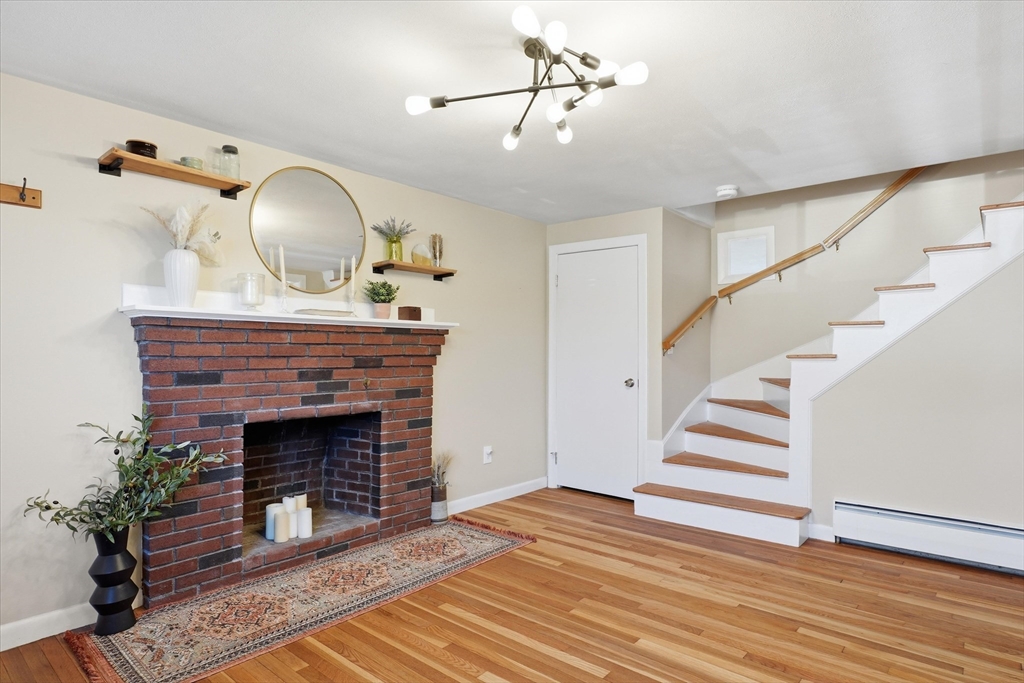 27 Garfield Avenue Saugus, MA 01906 - Photo 14 of 41 a view of an entryway with fireplace
