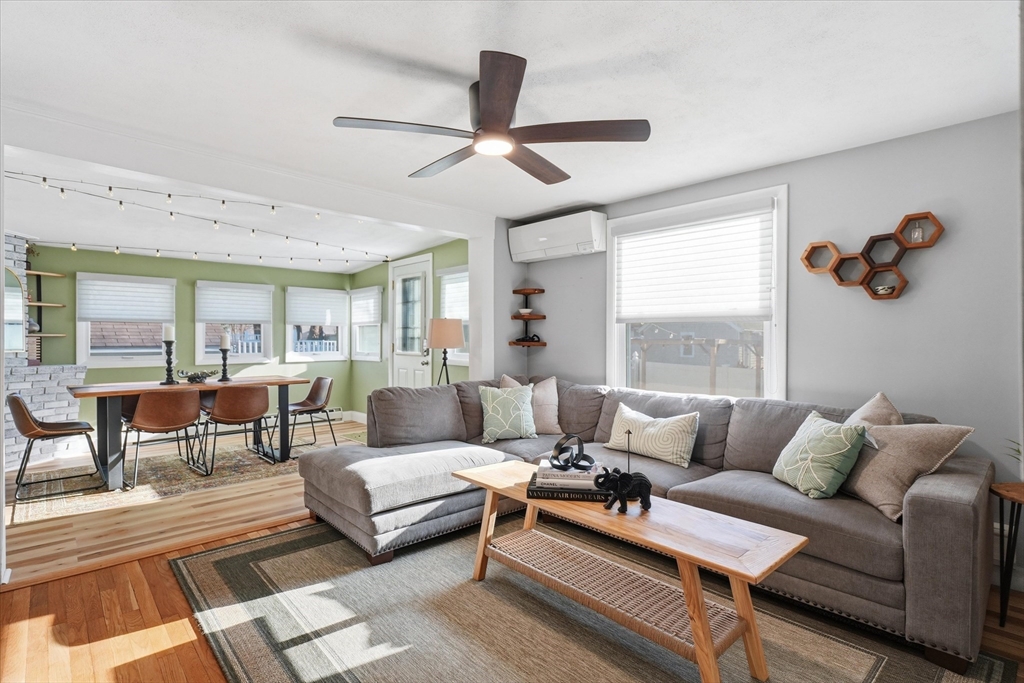 27 Garfield Avenue Saugus, MA 01906 - Photo 18 of 41 a living room with furniture and a large window