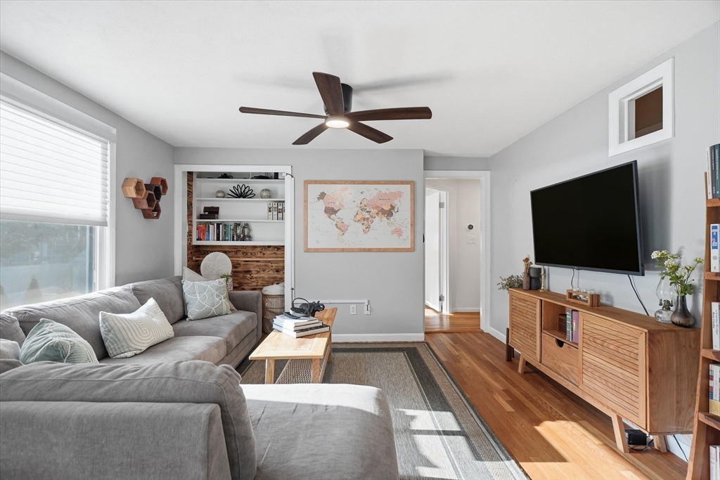 27 Garfield Avenue Saugus, MA 01906 - Photo 20 of 41 a living room with furniture and a flat screen tv