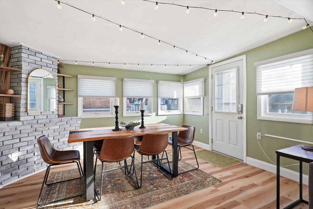 27 Garfield Avenue Saugus, MA 01906 - Photo 22 of 41 a dining room with furniture a rug and wooden floor