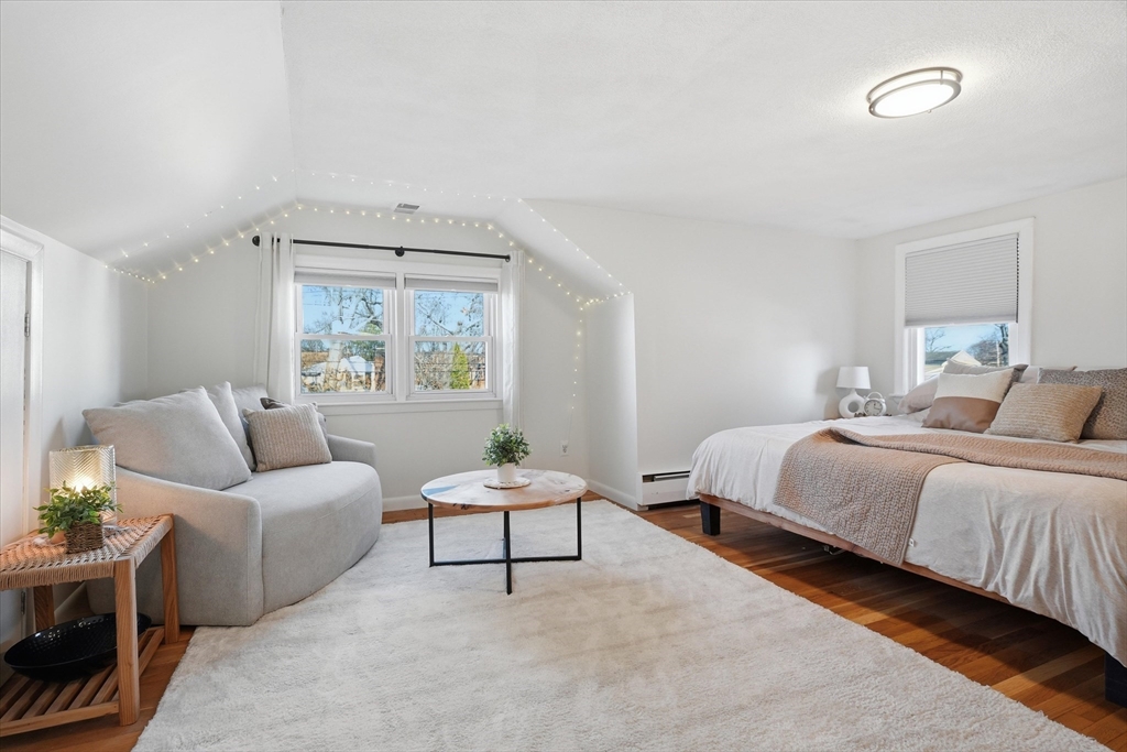 27 Garfield Avenue Saugus, MA 01906 - Photo 25 of 41 a spacious bedroom with a bed and a couch