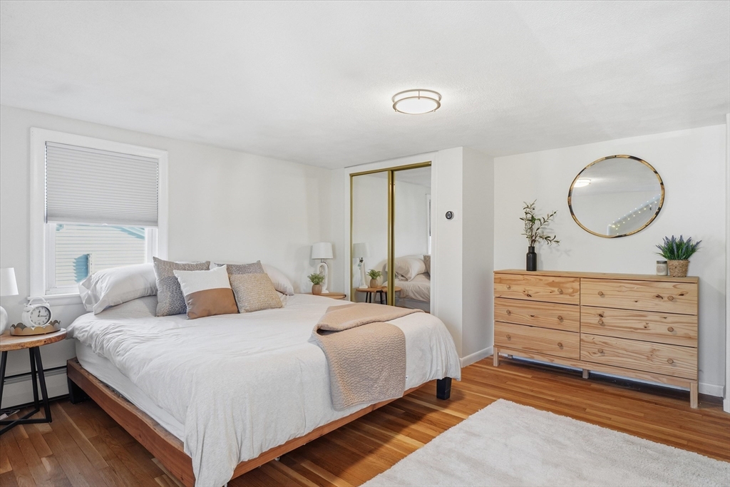 27 Garfield Avenue Saugus, MA 01906 - Photo 27 of 41 a bedroom with a bed and a dresser