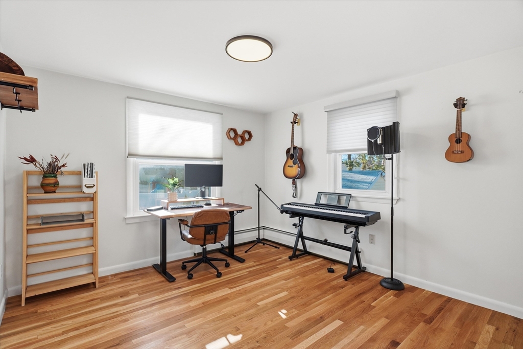 27 Garfield Avenue Saugus, MA 01906 - Photo 32 of 41 a view of a workspace with furniture and wooden floor