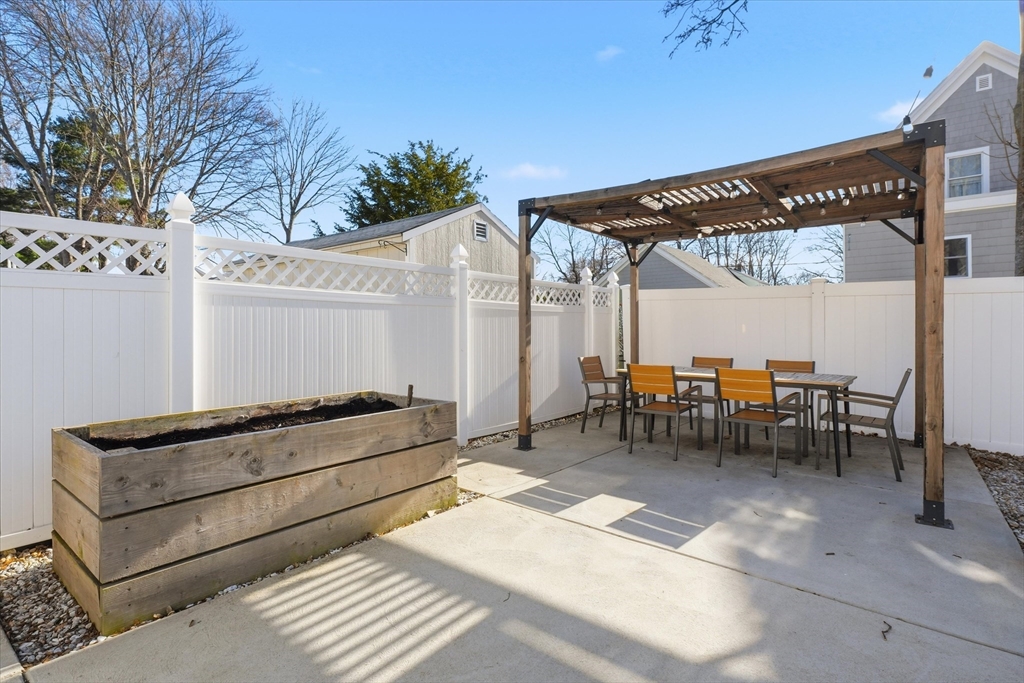 27 Garfield Avenue Saugus, MA 01906 - Photo 35 of 41 a view of a two chairs in the patio