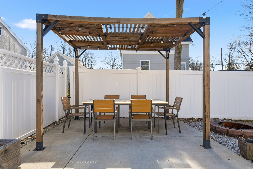 27 Garfield Avenue Saugus, MA 01906 - Photo 36 of 41 a view of a chairs and table in the patio