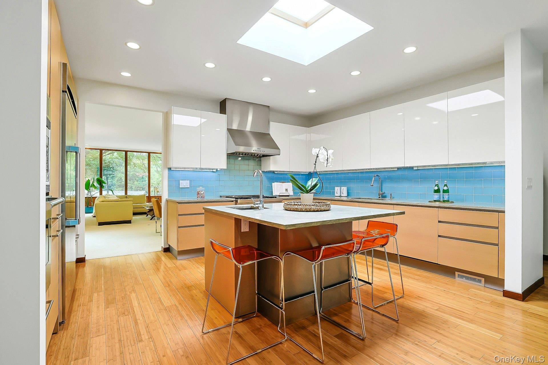 20 Sprain Valley Road Scarsdale, NY 10583 - Photo 15 of 30 Flooded with natural light from the overhead skylight, this stunning kitchen blends clean modern lines with exceptional craftsmanship and everyday practicality.