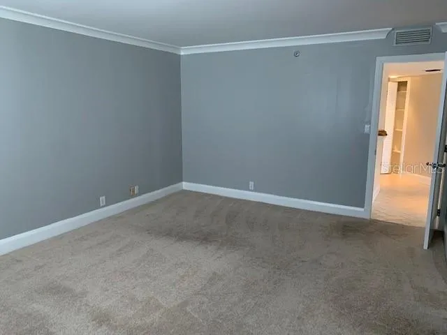 a view of an empty walk in closet