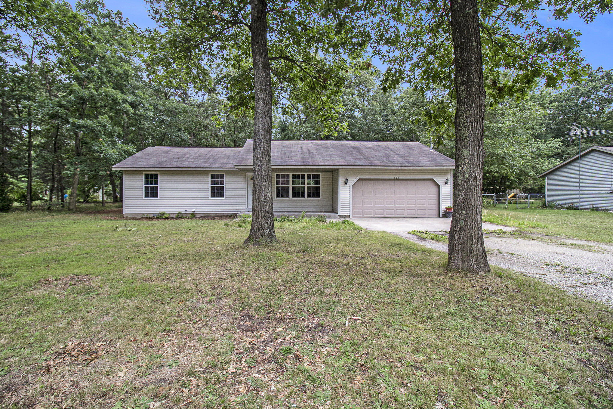 655 West Cedar Road Twin Lake, MI 49457 - Photo 1 of 15 002_5r6a8600
