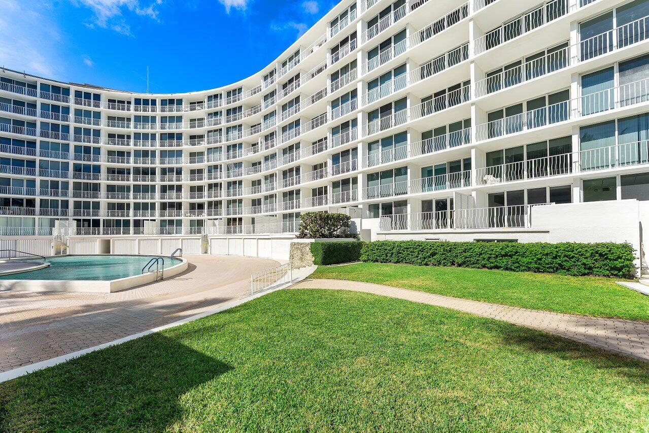 2774 South Ocean Boulevard, Unit 409 Palm Beach, FL 33480 - Photo 19 of 32 a view of building with garden