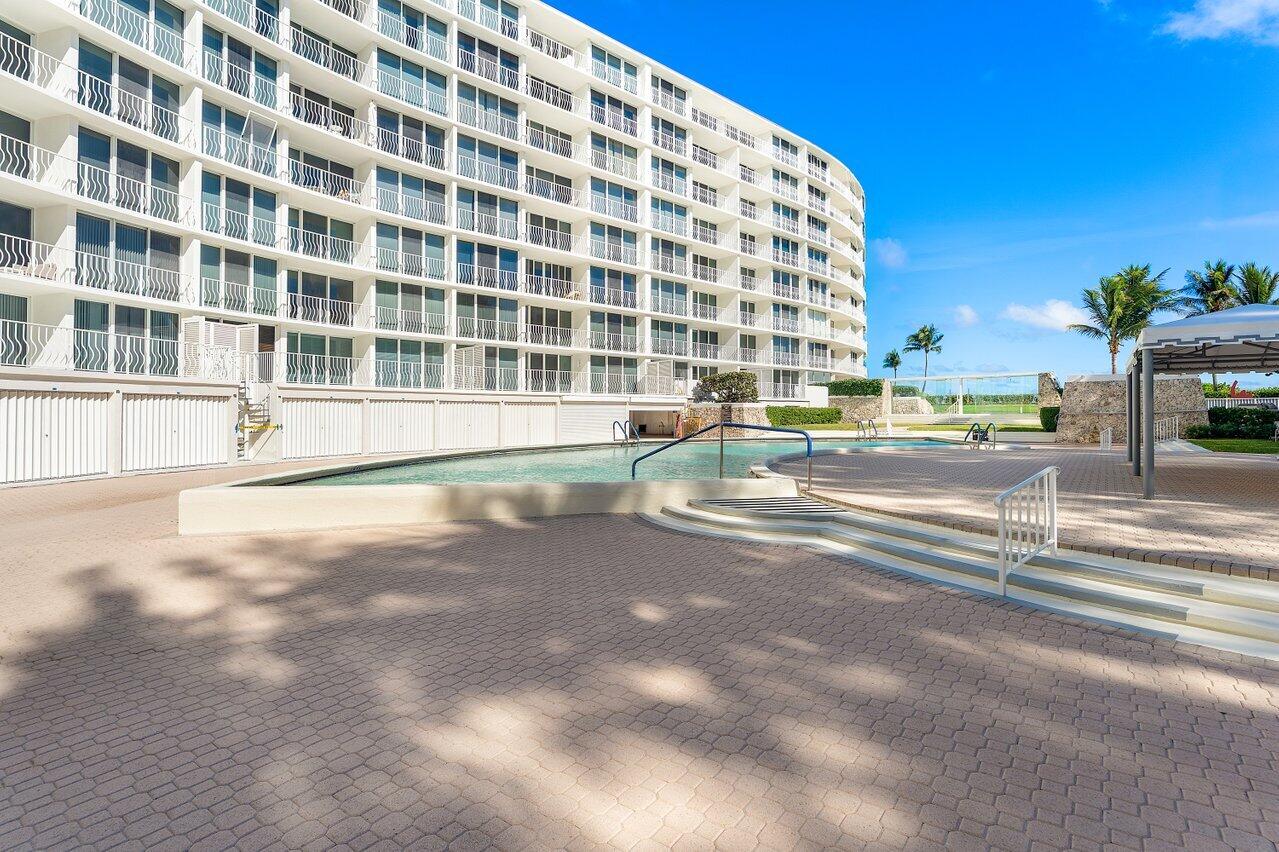 2774 South Ocean Boulevard, Unit 409 Palm Beach, FL 33480 - Photo 20 of 32 a view of building with a street
