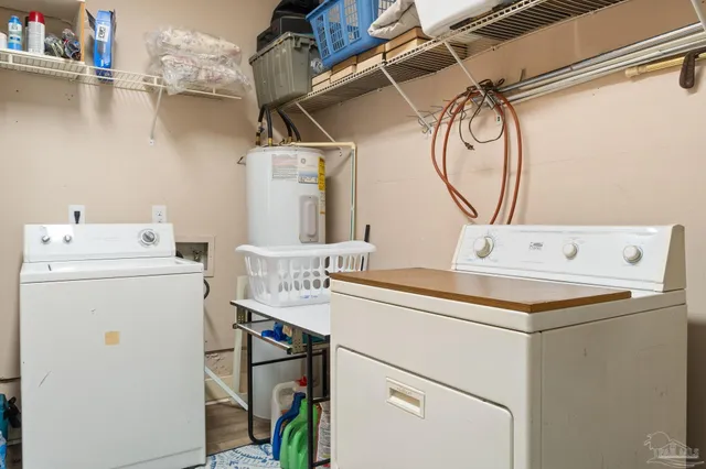 a utility room with dryer and washer