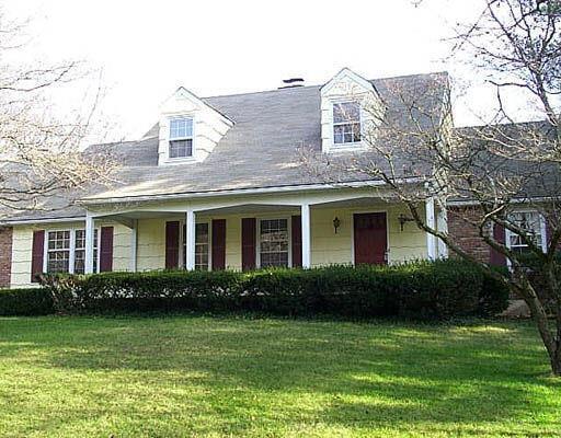 87 Russet Road Stamford, CT 06903 - Photo 1 of 1 a front view of a house with garden