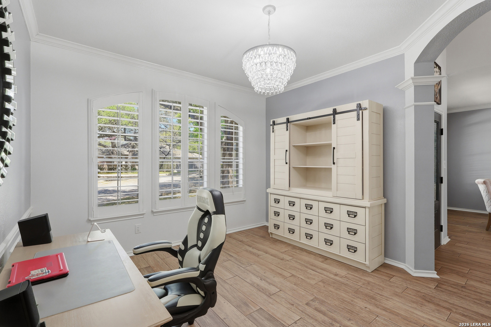 12703 Holly Cedar Helotes, TX 78023 - Photo 12 of 23 a view of a workspace with furniture and a window