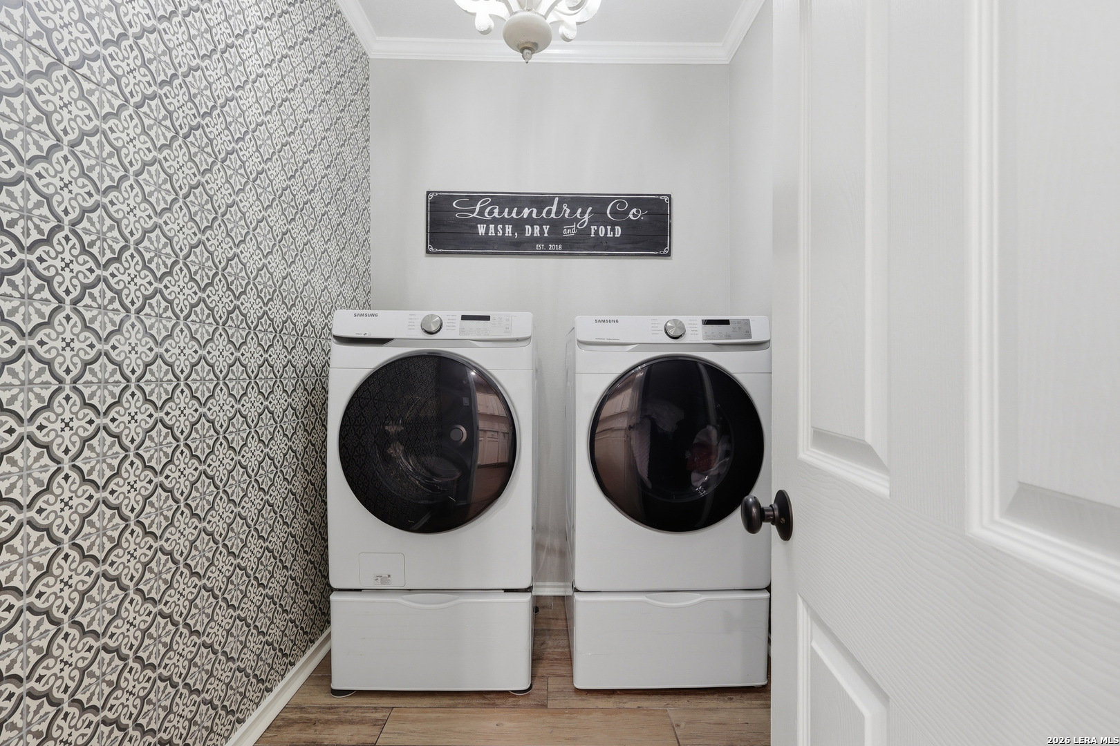 12703 Holly Cedar Helotes, TX 78023 - Photo 13 of 23 a view of a hallway with washer and dryer