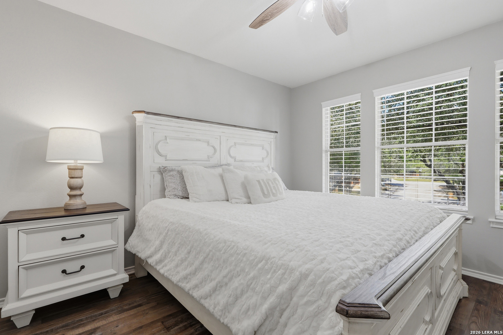 12703 Holly Cedar Helotes, TX 78023 - Photo 18 of 23 a bedroom with a bed and a window