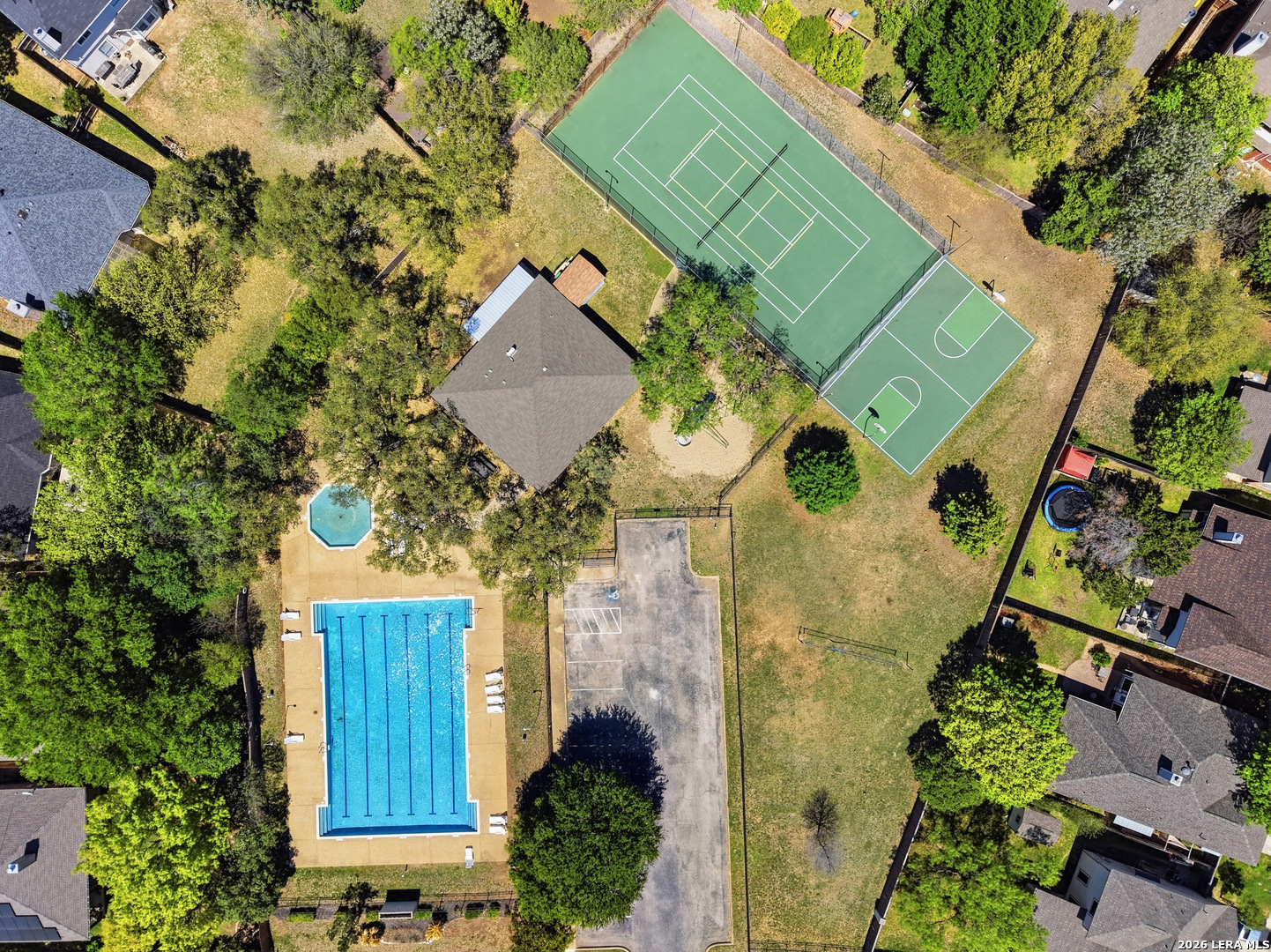 12703 Holly Cedar Helotes, TX 78023 - Photo 23 of 23 an aerial view of a house with a yard
