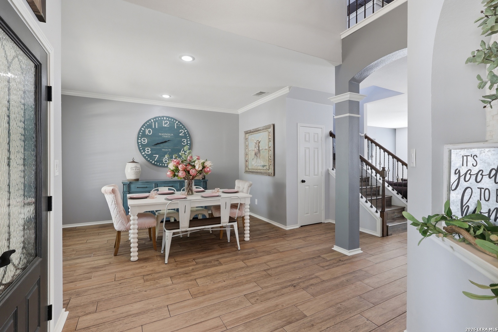 12703 Holly Cedar Helotes, TX 78023 - Photo 6 of 23 a view of a dining room with furniture and wooden floor
