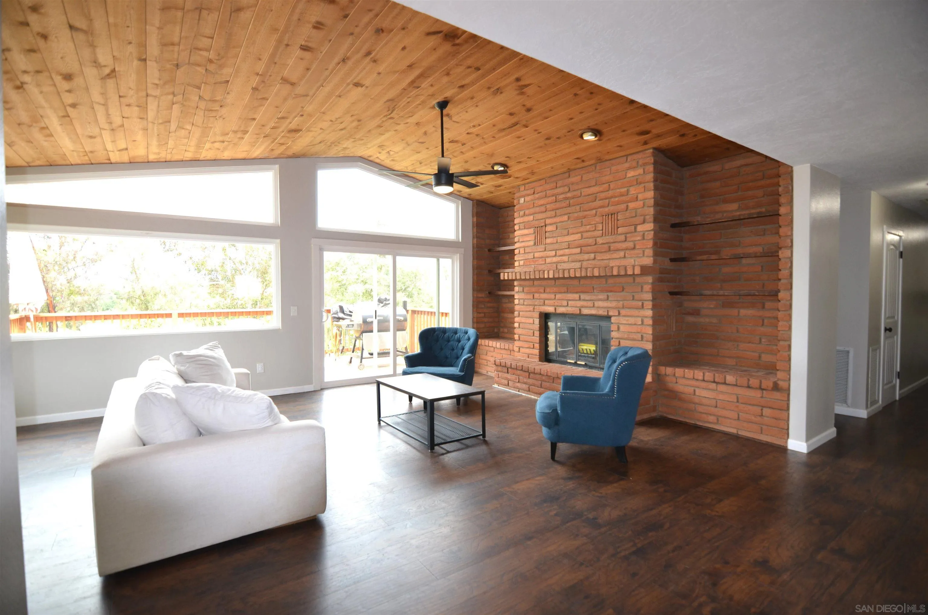 30643 Rabbit Run Valley Center, CA 92082 - Photo 11 of 59 a living room with furniture and a large window