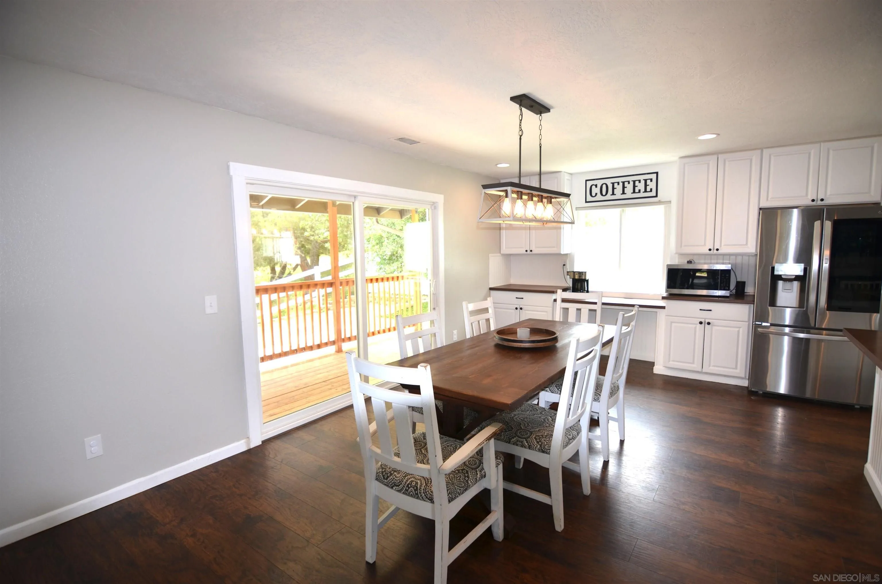 30643 Rabbit Run Valley Center, CA 92082 - Photo 2 of 59 a view of a dining room with furniture window and wooden floor