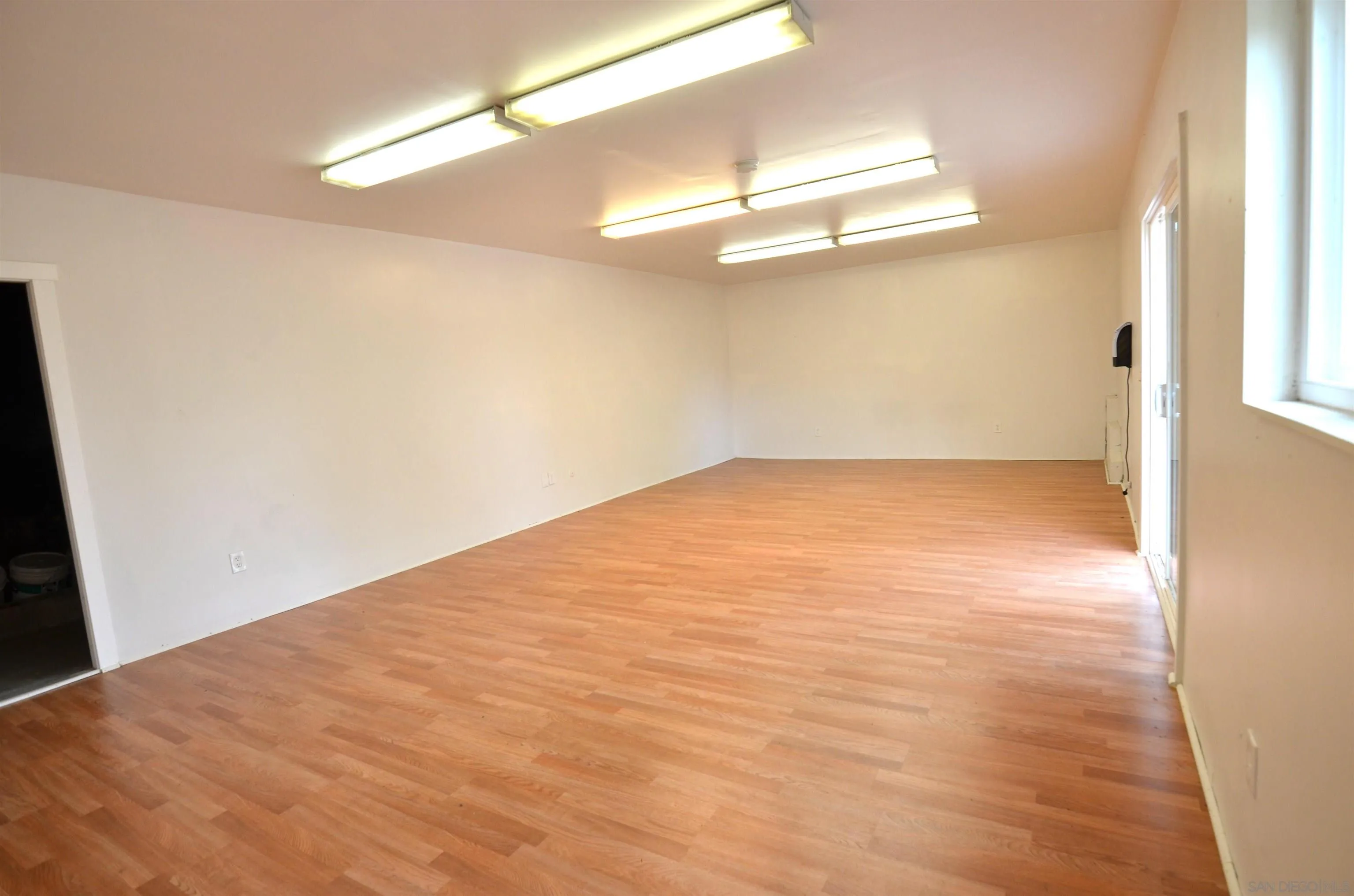 30643 Rabbit Run Valley Center, CA 92082 - Photo 34 of 59 a view of empty room with wooden floor and fan