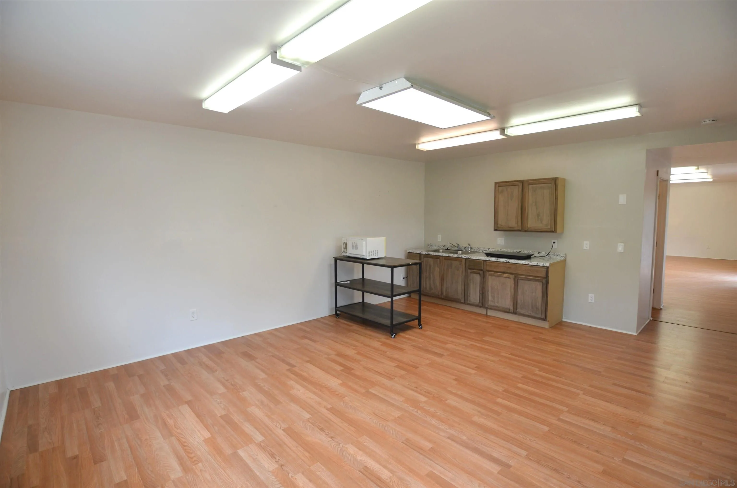 30643 Rabbit Run Valley Center, CA 92082 - Photo 35 of 59 a room with furniture and a wooden floor