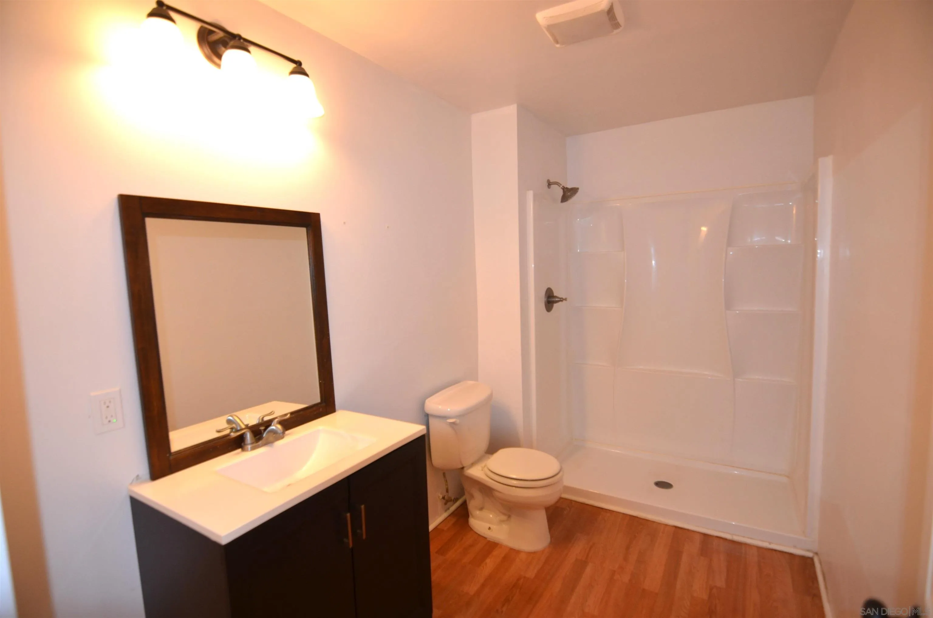 30643 Rabbit Run Valley Center, CA 92082 - Photo 39 of 59 a bathroom with a sink and a mirror