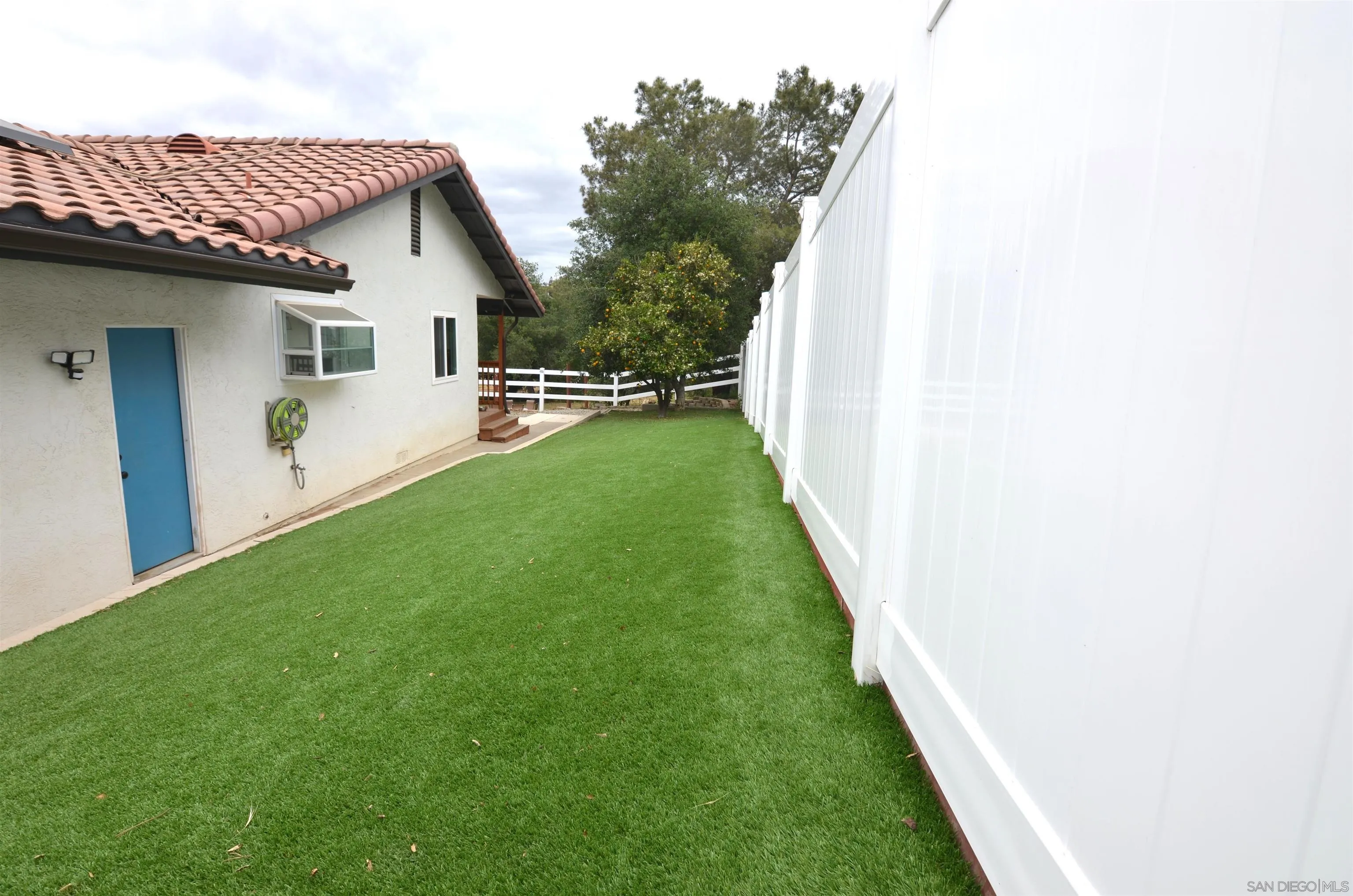 30643 Rabbit Run Valley Center, CA 92082 - Photo 48 of 59 a view of a backyard with plants and a patio