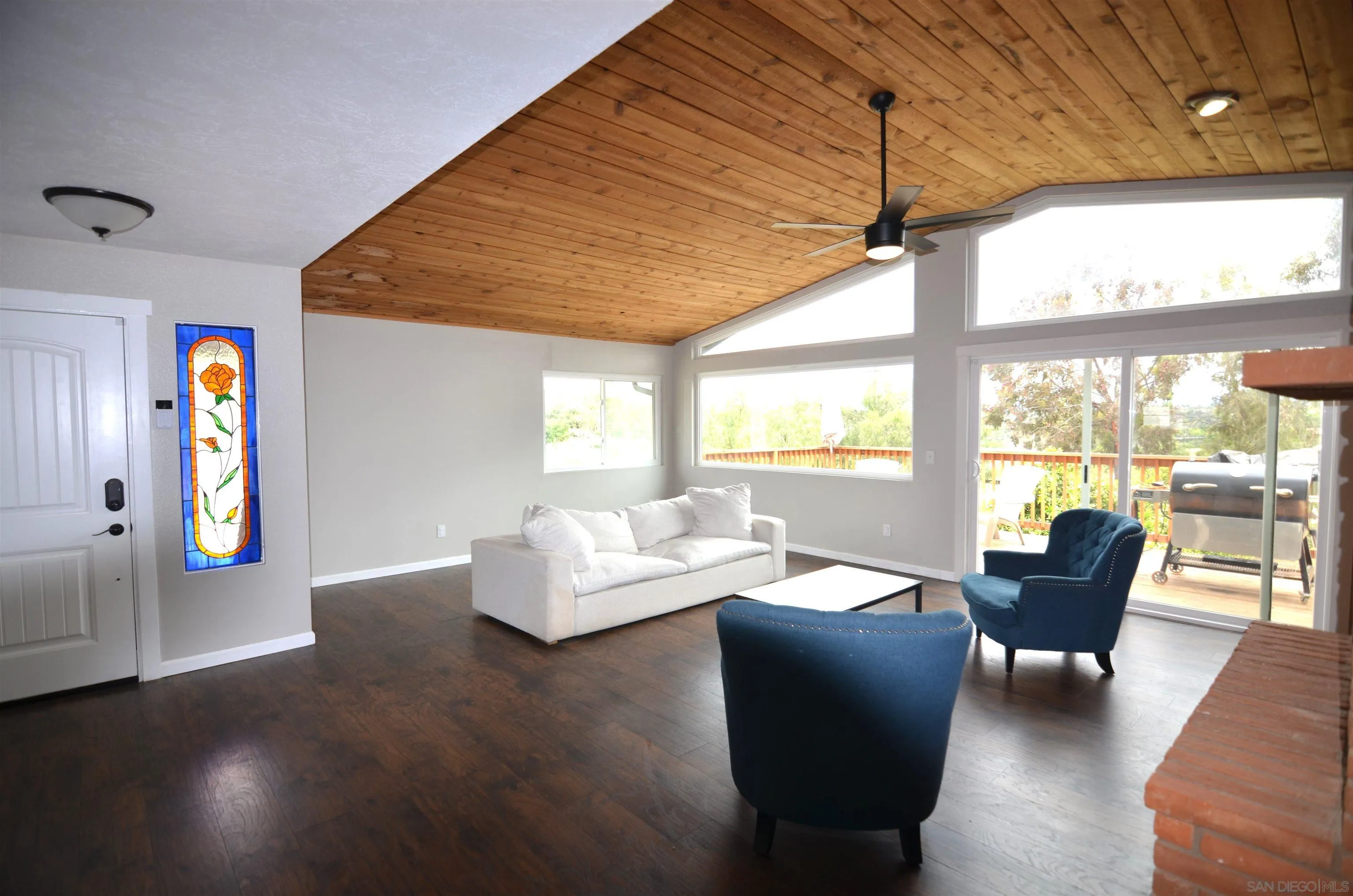 30643 Rabbit Run Valley Center, CA 92082 - Photo 10 of 59 a living room with furniture and large windows
