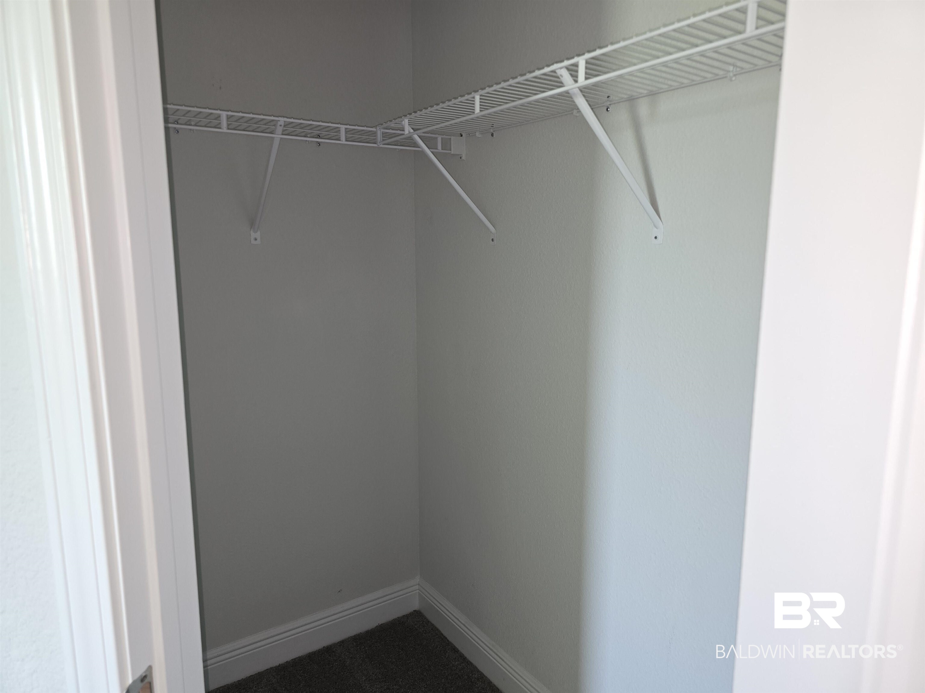 23035 Ridgewood Drive Robertsdale, AL 36567 - Photo 6 of 17 Master Closet 2