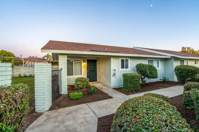 a view of a house with patio