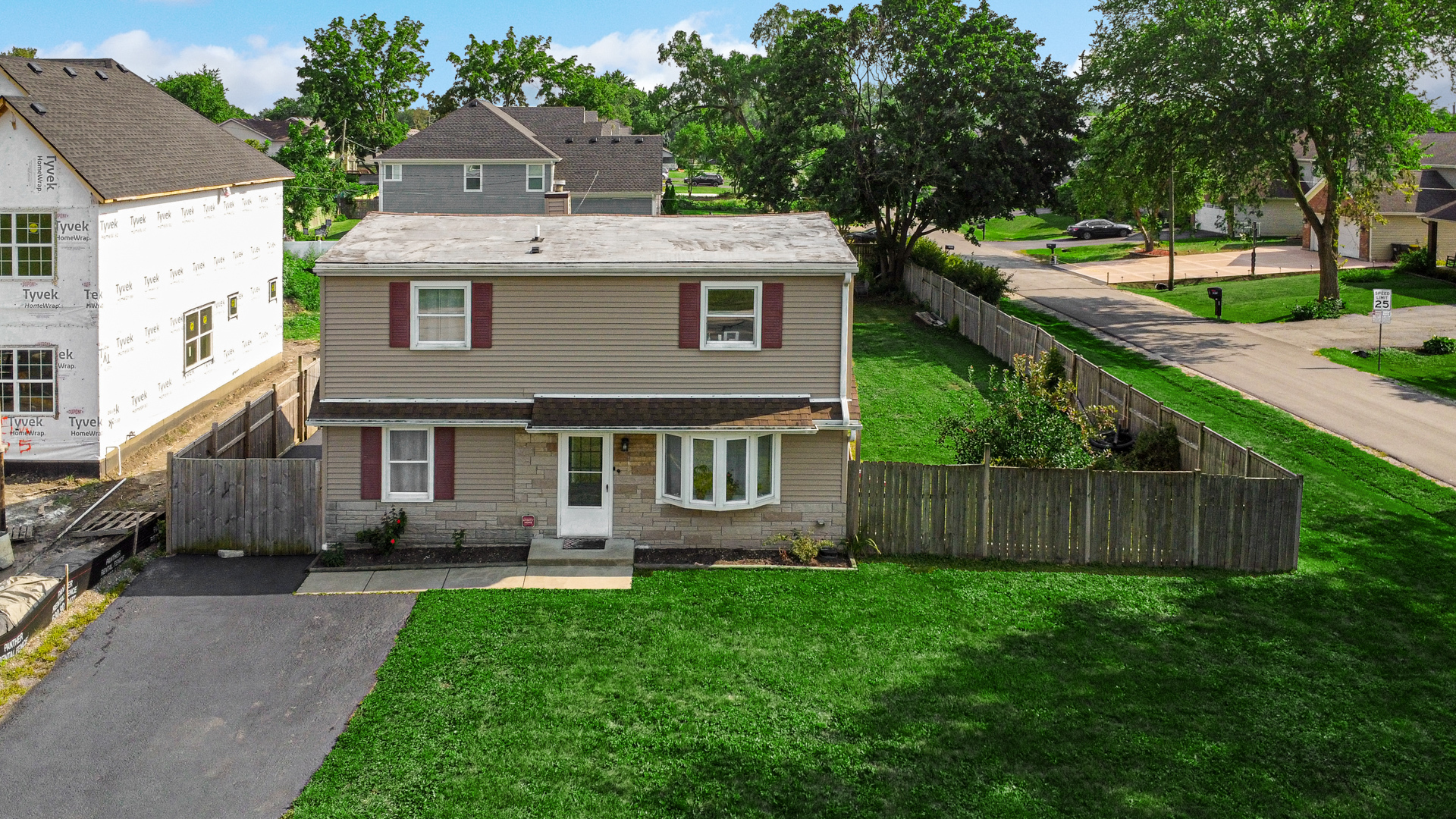 25W277 Doris Avenue Carol Stream, IL 60188 - Photo 21 of 27 a view of a house with a yard and sitting area
