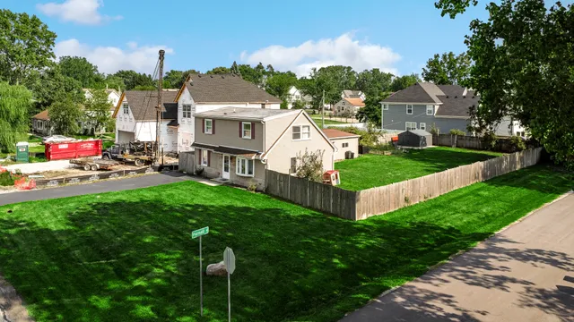 an aerial view of a house with a garden