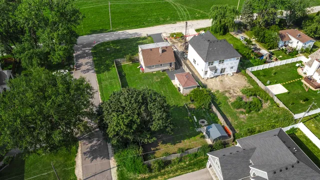 an aerial view of a house with a garden