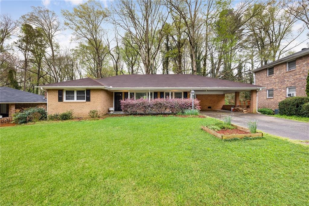 3449 Finesse Drive Decatur, GA 30032 - Photo 1 of 1 a view of house with a yard