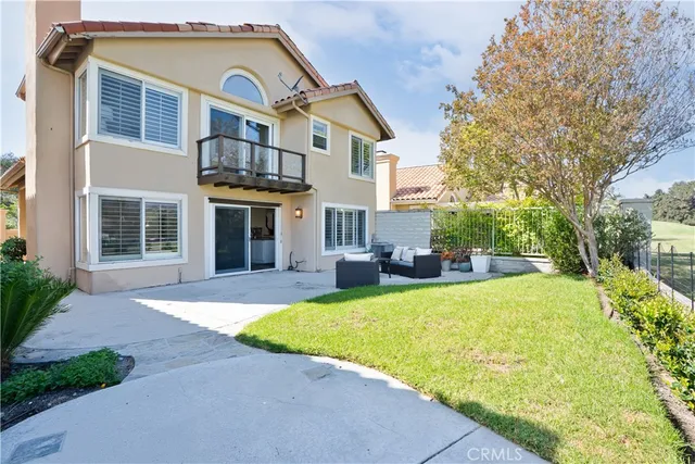 a view of a house with a swimming pool