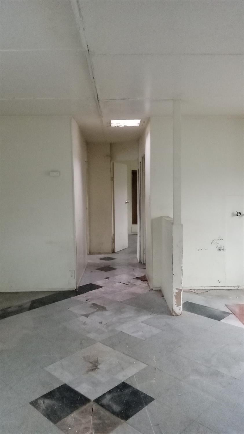 801 Schipper Street, Unit 60 Arvin, CA 93203 - Photo 6 of 8 a view of a hallway with wooden floor