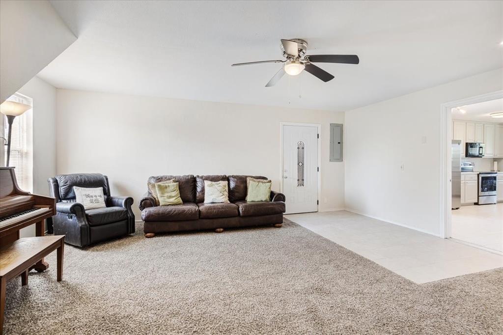 336 Old Highway 6 Howe, TX 75459 - Photo 13 of 40 a living room with furniture and a ceiling fan
