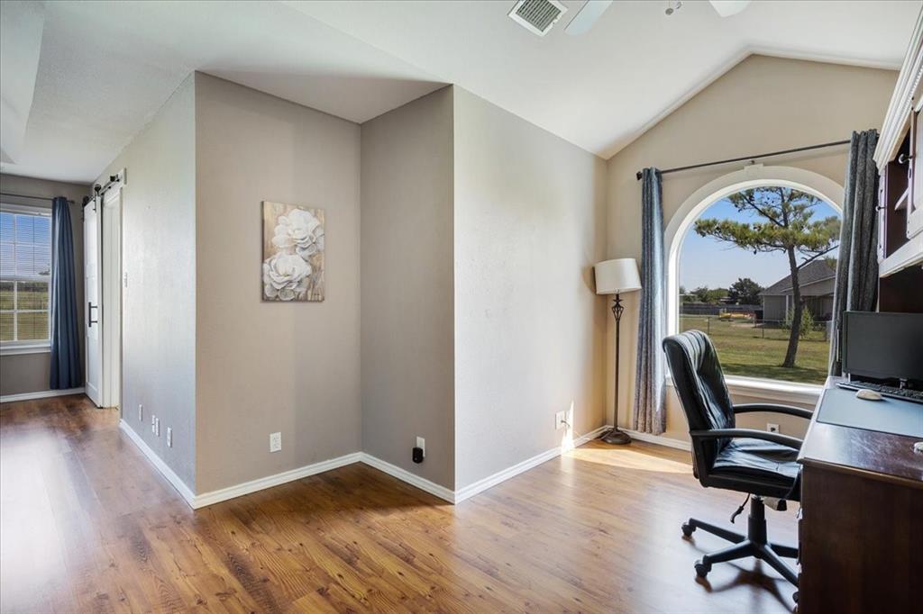 336 Old Highway 6 Howe, TX 75459 - Photo 17 of 40 a view of workspace with wooden floor and fan