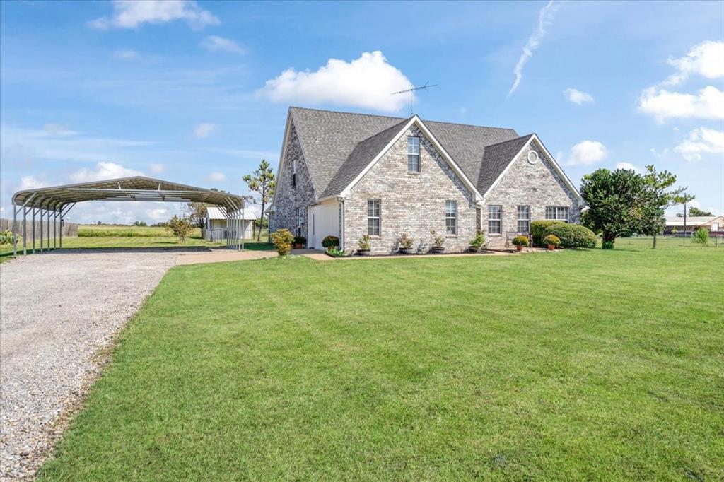 336 Old Highway 6 Howe, TX 75459 - Photo 3 of 40 a view of a house with a big yard and potted plants
