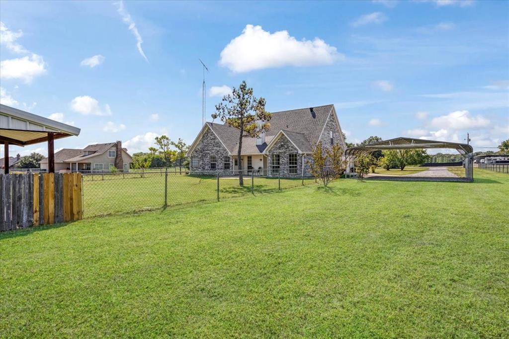 336 Old Highway 6 Howe, TX 75459 - Photo 30 of 40 a view of a house with a big yard and potted plants