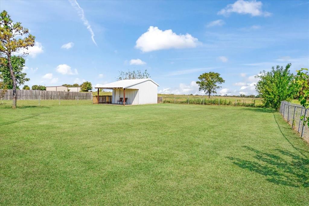 336 Old Highway 6 Howe, TX 75459 - Photo 31 of 40 a view of a big yard with a bench